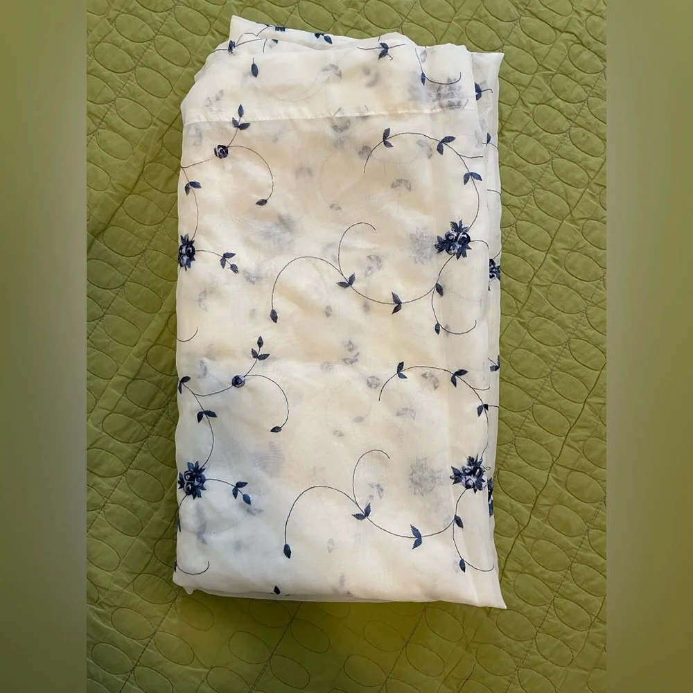White Sheer Shower Curtains with a pattern delicate blue flowers through out